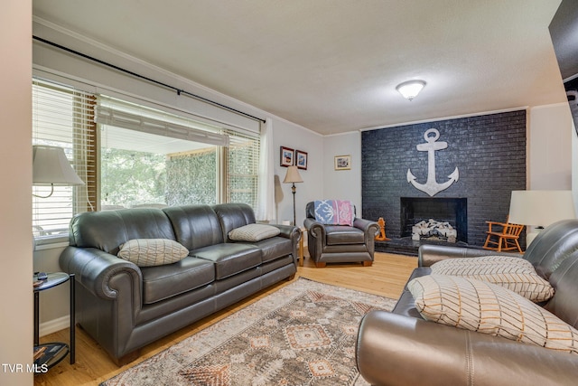 312 Timberlane Rd, Bristol, TN 37620 - living area with crown molding, wood finished floors, and a fireplace