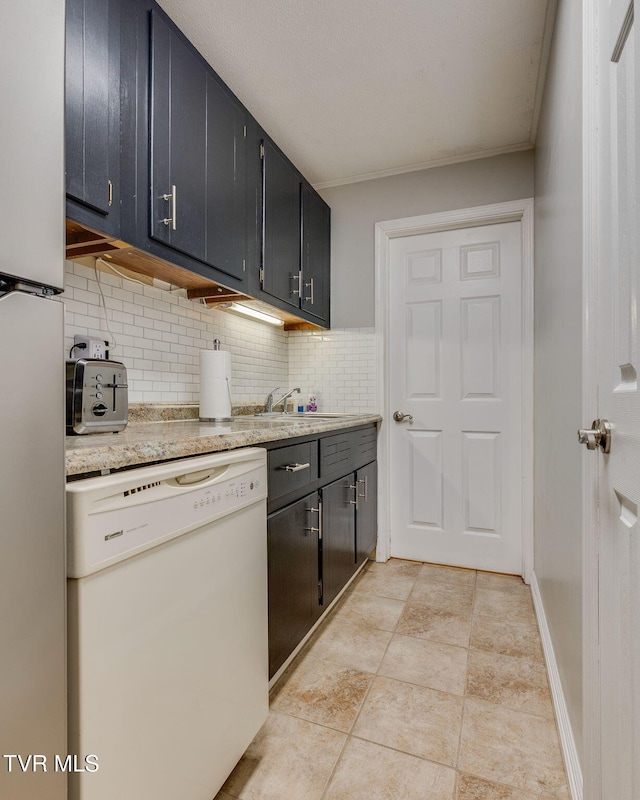 312 Timberlane Rd, Bristol, TN 37620 - kitchen with white appliances, backsplash, crown molding, and dark cabinets