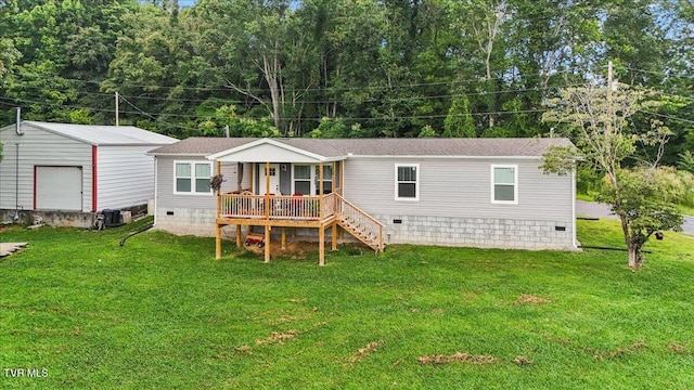 145 Oakwood Dr Way, Newport, TN 37821 - back of property with crawl space, a yard, covered porch, and a shingled roof
