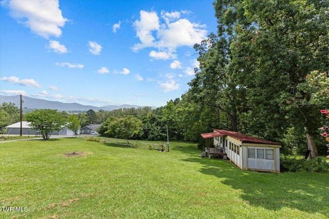 145 Oakwood Dr Way, Newport, TN 37821 - view of green lawn featuring a mountain view and an outbuilding