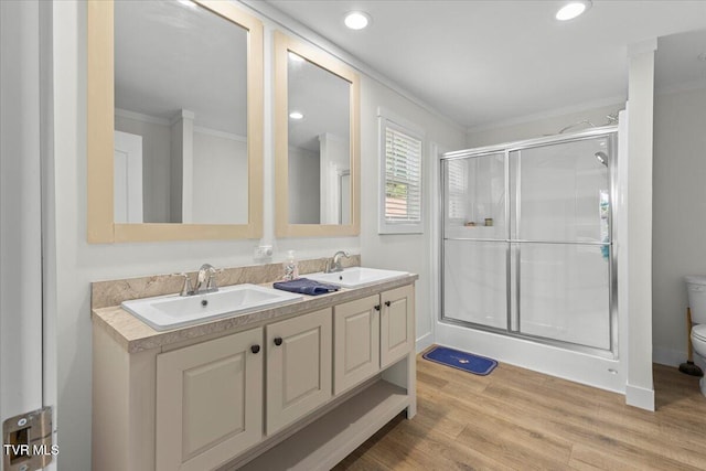 145 Oakwood Dr Way, Newport, TN 37821 - full bath with a stall shower, double vanity, wood finished floors, ornamental molding, and recessed lighting