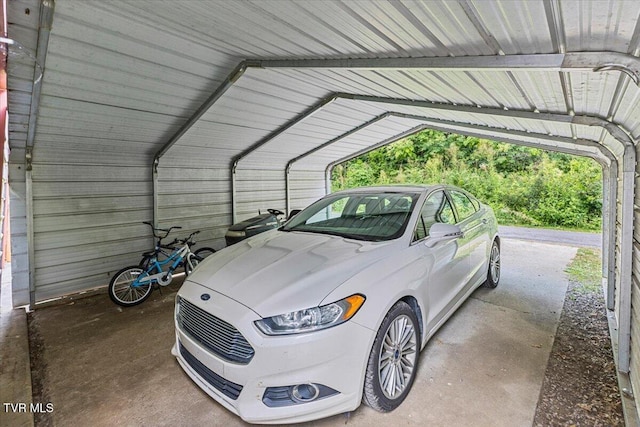 145 Oakwood Dr Way, Newport, TN 37821 - garage featuring a detached carport