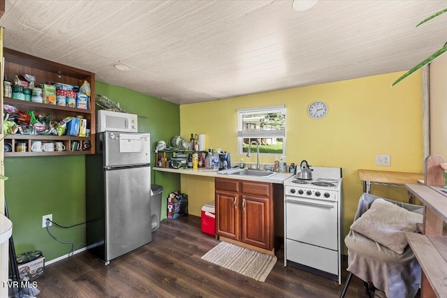 145 Oakwood Dr Way, Newport, TN 37821 - kitchen with white appliances, dark wood-type flooring, and light countertops