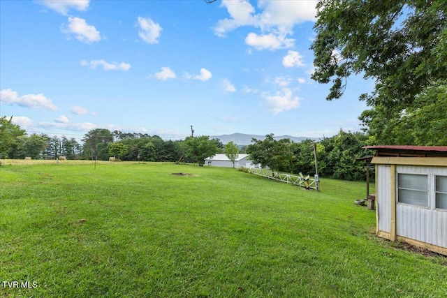 145 Oakwood Dr Way, Newport, TN 37821 - view of green lawn with a mountain view and an outbuilding
