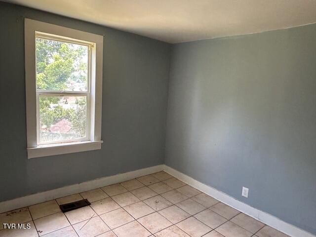 938 Barker St, Bristol, TN 37620 - spare room featuring baseboards and light tile patterned floors