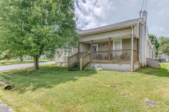 218 Kirkwood St, Glade Spring, VA 24340 - bungalow-style house featuring a porch, a chimney, a front yard, crawl space, and roof with shingles