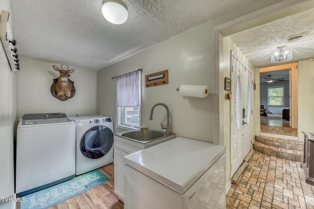 218 Kirkwood St, Glade Spring, VA 24340 - laundry area featuring independent washer and dryer, a textured ceiling, and ceiling fan