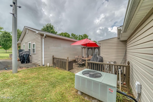 218 Kirkwood St, Glade Spring, VA 24340 - view of grassy yard featuring a wooden deck and outdoor lounge area