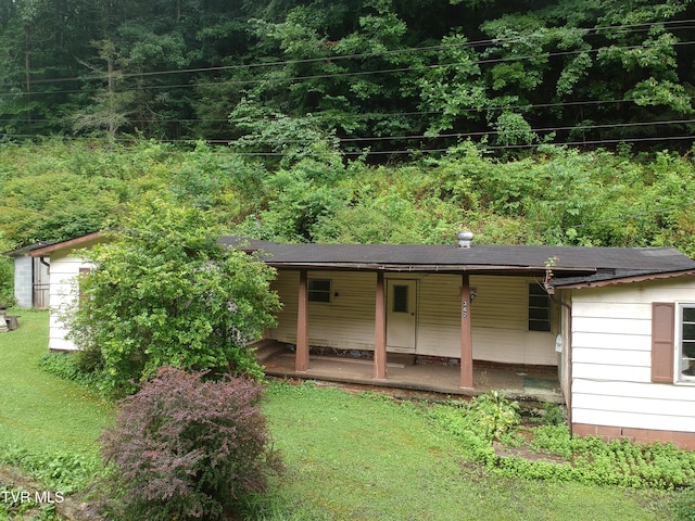 362 Rakes Ridge Rd, Birchleaf, VA 24220 - back of house featuring a porch and a lawn