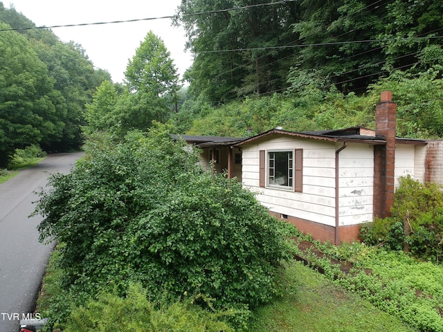 362 Rakes Ridge Rd, Birchleaf, VA 24220 - view of side of property featuring a chimney