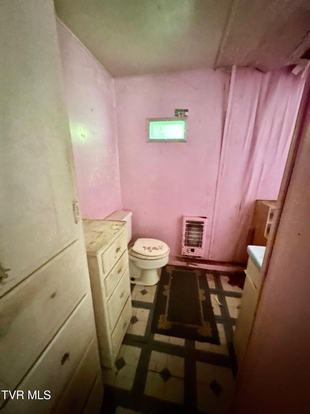 362 Rakes Ridge Rd, Birchleaf, VA 24220 - bathroom featuring heating unit, vanity, and tile patterned floors