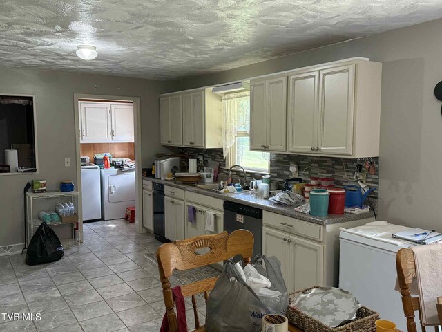 2818 Dungannon Rd, Coeburn, VA 24230 - kitchen featuring dishwasher, tasteful backsplash, washer and dryer, and fridge
