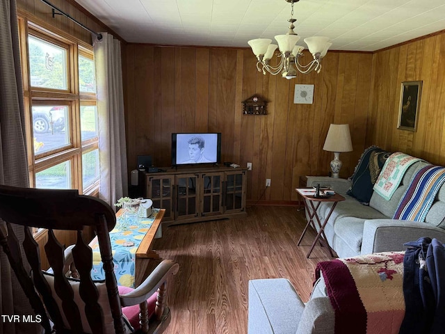 2818 Dungannon Rd, Coeburn, VA 24230 - living room featuring a chandelier, wood finished floors, and wooden walls