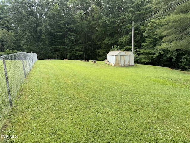 2818 Dungannon Rd, Coeburn, VA 24230 - view of yard featuring a shed and a wooded view