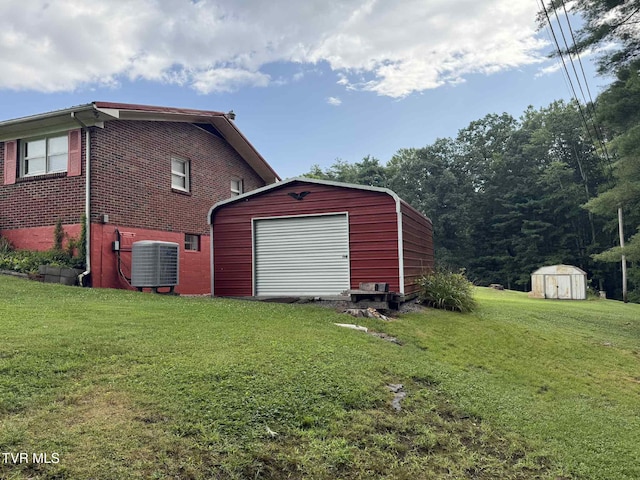 2818 Dungannon Rd, Coeburn, VA 24230 - view of side of property featuring a lawn, brick siding, a garage, and a storage shed