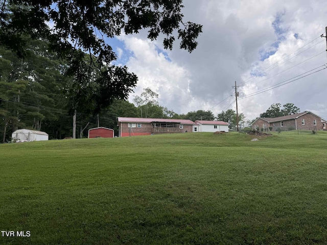 2818 Dungannon Rd, Coeburn, VA 24230 - view of green lawn featuring a shed