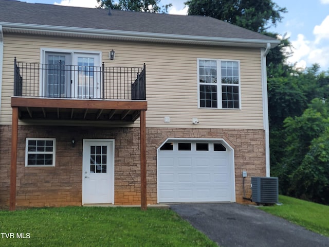 63 Whisper Bnd Unit 1, Johnson City, TN 37604 - view of front facade with a garage, asphalt driveway, a balcony, and roof with shingles