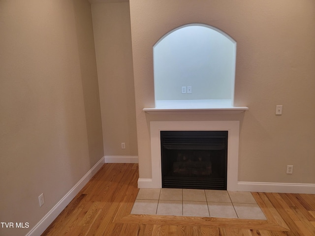 63 Whisper Bnd Unit 1, Johnson City, TN 37604 - detailed view of wood finished floors and a fireplace with flush hearth
