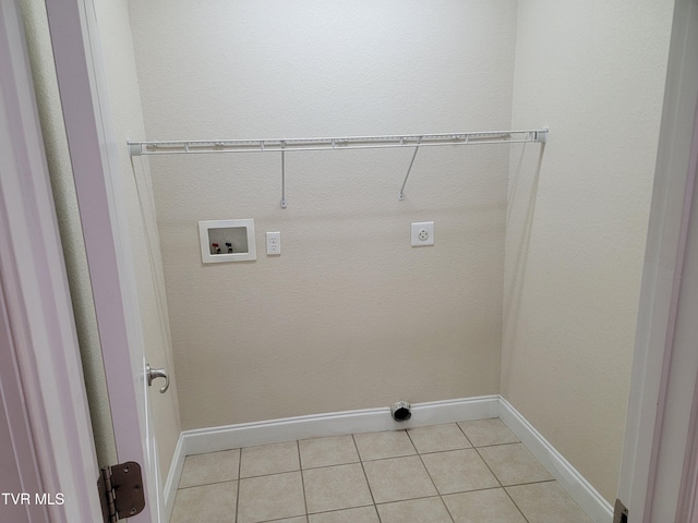63 Whisper Bnd Unit 1, Johnson City, TN 37604 - laundry room with electric dryer hookup, washer hookup, and light tile patterned flooring