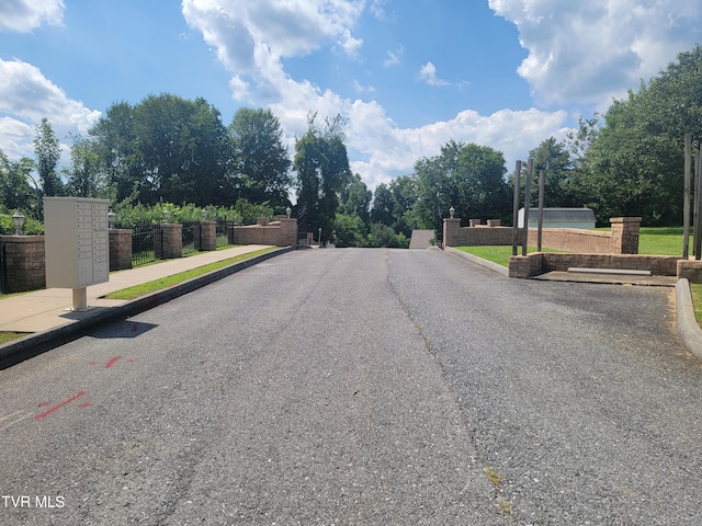 63 Whisper Bnd Unit 1, Johnson City, TN 37604 - view of asphalt road featuring curbs