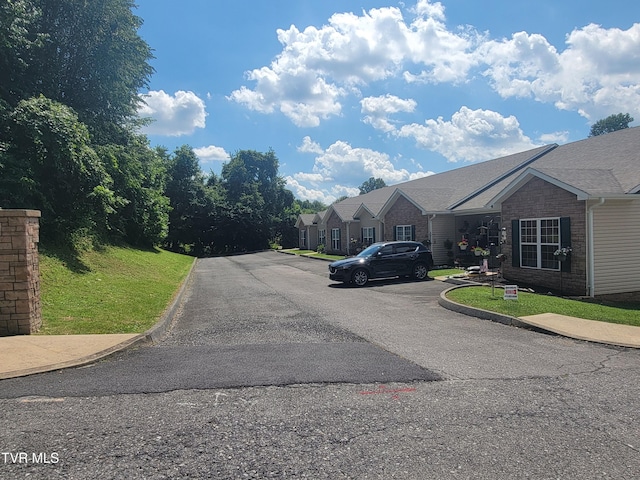 63 Whisper Bnd Unit 1, Johnson City, TN 37604 - view of asphalt road with curbs