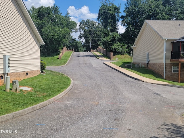 63 Whisper Bnd Unit 1, Johnson City, TN 37604 - view of asphalt street featuring curbs and view of scattered trees