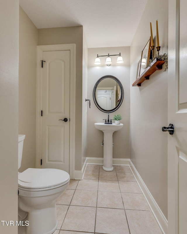 417 Piper Gln, Gray, TN 37615 - bathroom featuring tile patterned flooring and toilet
