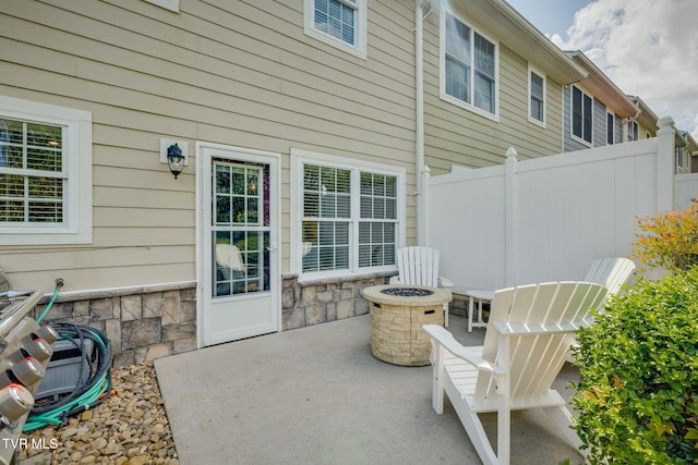 417 Piper Gln, Gray, TN 37615 - view of patio featuring an outdoor fire pit