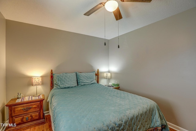 107 Dover Ln, Bristol, TN 37620 - bedroom with wood finished floors and ceiling fan