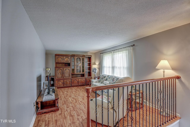 107 Dover Ln, Bristol, TN 37620 - corridor featuring wood finished floors and a textured ceiling