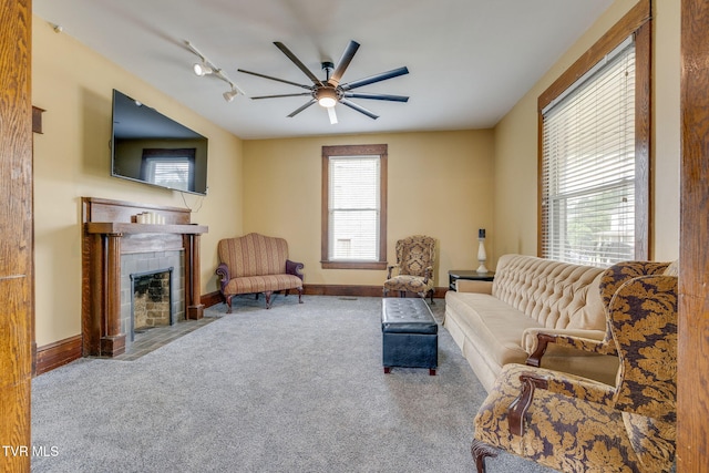 522 Alabama St, Bristol, TN 37620 - carpeted living room featuring a tiled fireplace and ceiling fan