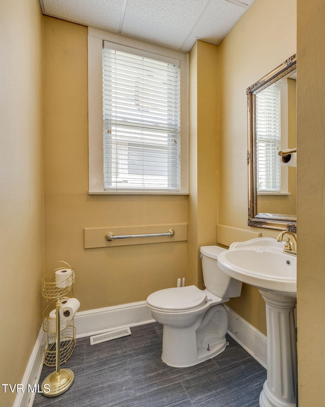 522 Alabama St, Bristol, TN 37620 - bathroom with toilet and a paneled ceiling