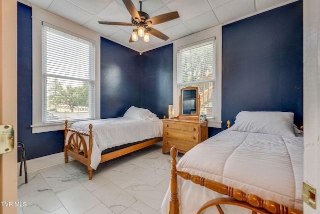 522 Alabama St, Bristol, TN 37620 - bedroom featuring light marble finish floors, a paneled ceiling, and a ceiling fan