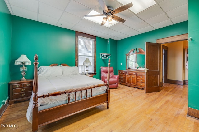 522 Alabama St, Bristol, TN 37620 - bedroom with wood finished floors, a paneled ceiling, and a ceiling fan