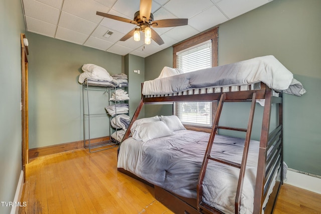 522 Alabama St, Bristol, TN 37620 - bedroom with a drop ceiling, wood finished floors, and ceiling fan
