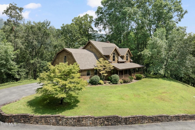 2019 Ridgeview Dr, Big Stone Gap, VA 24219 - view of front of property with a front lawn and a shingled roof