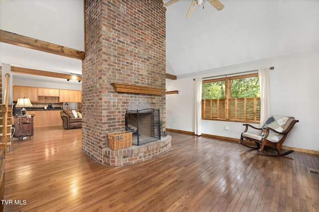 2019 Ridgeview Dr, Big Stone Gap, VA 24219 - living area with a brick fireplace, hardwood / wood-style flooring, high vaulted ceiling, and ceiling fan