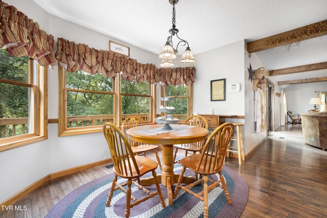 2019 Ridgeview Dr, Big Stone Gap, VA 24219 - dining area featuring hardwood / wood-style floors, a textured ceiling, and beam ceiling