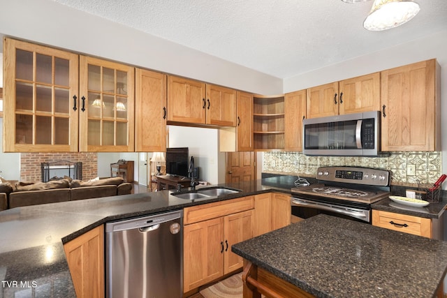 2019 Ridgeview Dr, Big Stone Gap, VA 24219 - kitchen with stainless steel appliances, open shelves, tasteful backsplash, dark stone counters, and a textured ceiling