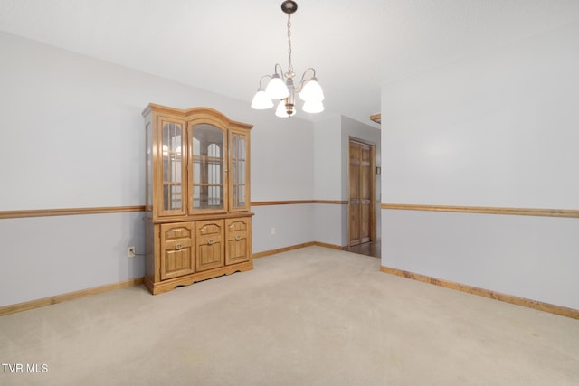 2019 Ridgeview Dr, Big Stone Gap, VA 24219 - spare room with a chandelier and light colored carpet