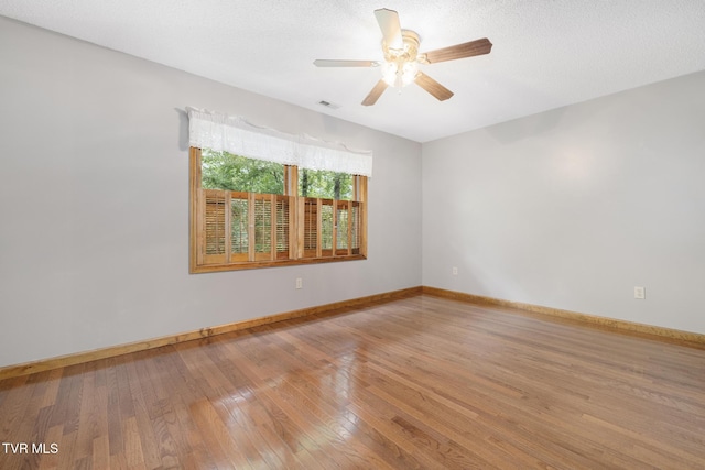 2019 Ridgeview Dr, Big Stone Gap, VA 24219 - empty room featuring wood-type flooring and a ceiling fan