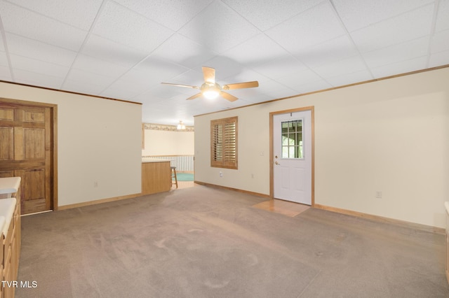 2019 Ridgeview Dr, Big Stone Gap, VA 24219 - unfurnished living room featuring a ceiling fan, light carpet, and a paneled ceiling