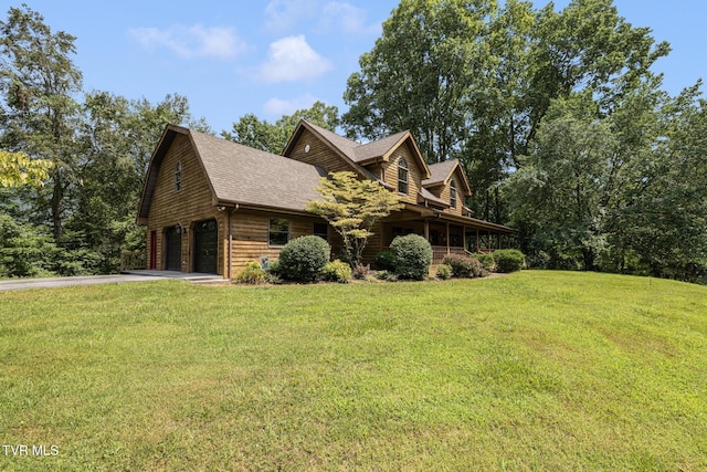 2019 Ridgeview Dr, Big Stone Gap, VA 24219 - view of front of home with driveway, a front yard, and an attached garage