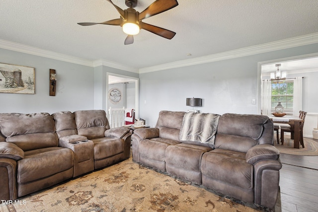 188 Mcarthur Cir, Bristol, VA 24201 - living area with a chandelier, ornamental molding, ceiling fan, hardwood / wood-style flooring, and a textured ceiling