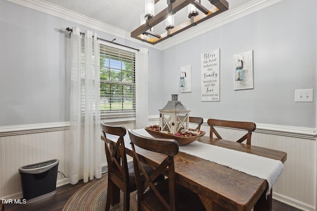 188 Mcarthur Cir, Bristol, VA 24201 - dining area with a wainscoted wall, ornamental molding, dark wood finished floors, and a chandelier