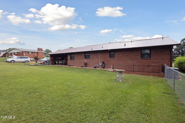 188 Mcarthur Cir, Bristol, VA 24201 - rear view of property with a metal roof and brick siding