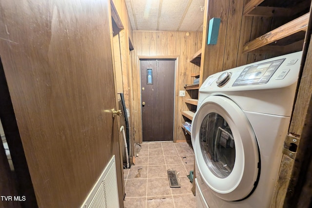 222 Warren Dr, Big Stone Gap, VA 24219 - laundry room with washer / clothes dryer, wooden walls, and light tile patterned flooring