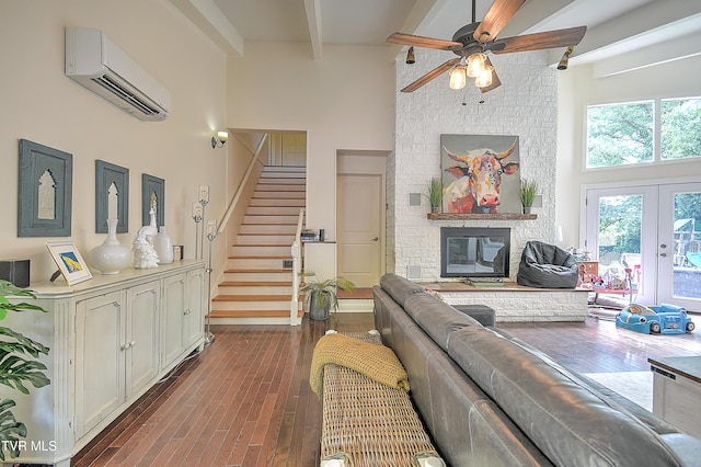 1108 Glen St, Bristol, TN 37620 - living area featuring a high ceiling, a ceiling fan, an AC wall unit, beam ceiling, and dark wood-style flooring