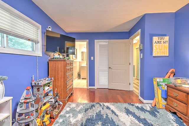 1108 Glen St, Bristol, TN 37620 - bedroom featuring hardwood / wood-style flooring and connected bathroom