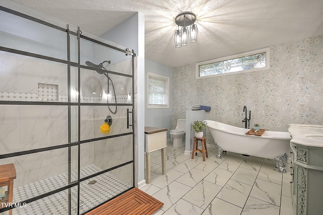 1108 Glen St, Bristol, TN 37620 - full bathroom with a freestanding bath, a shower stall, marble finish floors, a textured ceiling, and vanity
